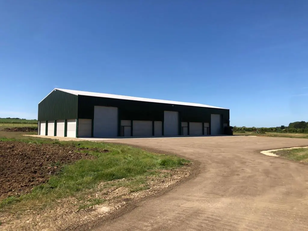 Distance photo of an agricultural building | agricultural roller shutters | County Industrial Doors
